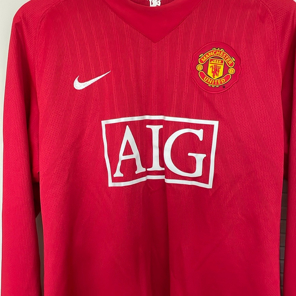 2007-2008 Manchester United long sleeve home shirt. Size L